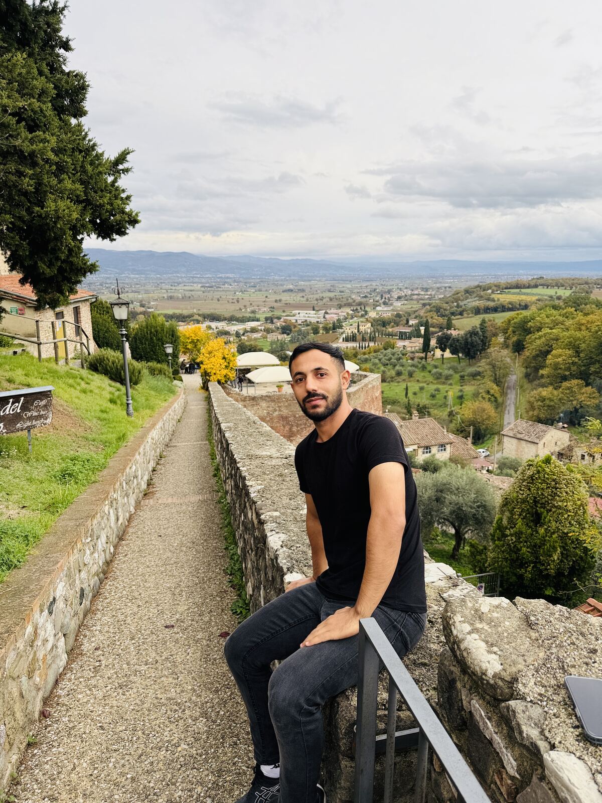 Mohammed on a hilltop overlooking the countryside, Tuscany, November 2025